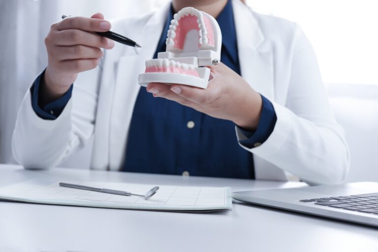 Dentist explaining process of treatment to patience, medical hea